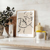 A bohemian-style illustration of a woman surrounded by celestial elements - styled on a counter with eucalyptus and a bowl of lemons