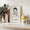 A woman in bohemian attire surrounded by abstract floral patterns - styled on a counter with eucalyptus and a bowl of lemons