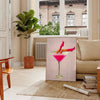 A woman holding a cocktail, illustrated in modern style with gray and orange tones - in a Parisian living room with a sofa and a fig plant
