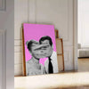 A pink and purple abstract artwork featuring a woman and a man - leaning on a herringbone floor against a white panelled wall