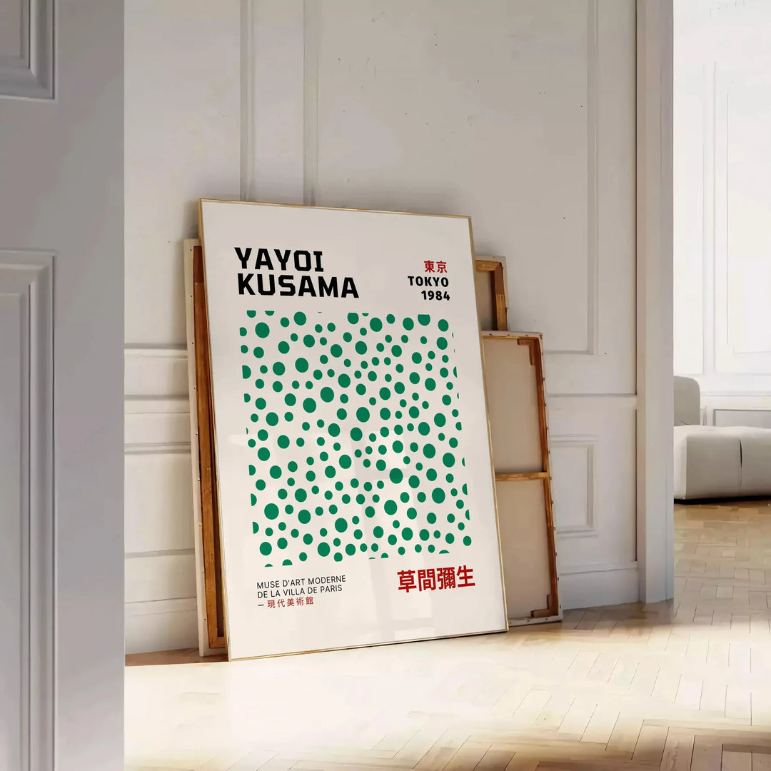 Abstract polka dot patterns in gray and blue by Yayoi Kusama - leaning on a herringbone floor against a white panelled wall