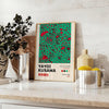 Abstract polka dot patterns in black and blue by Yayoi Kusama - styled on a counter with eucalyptus and a bowl of lemons