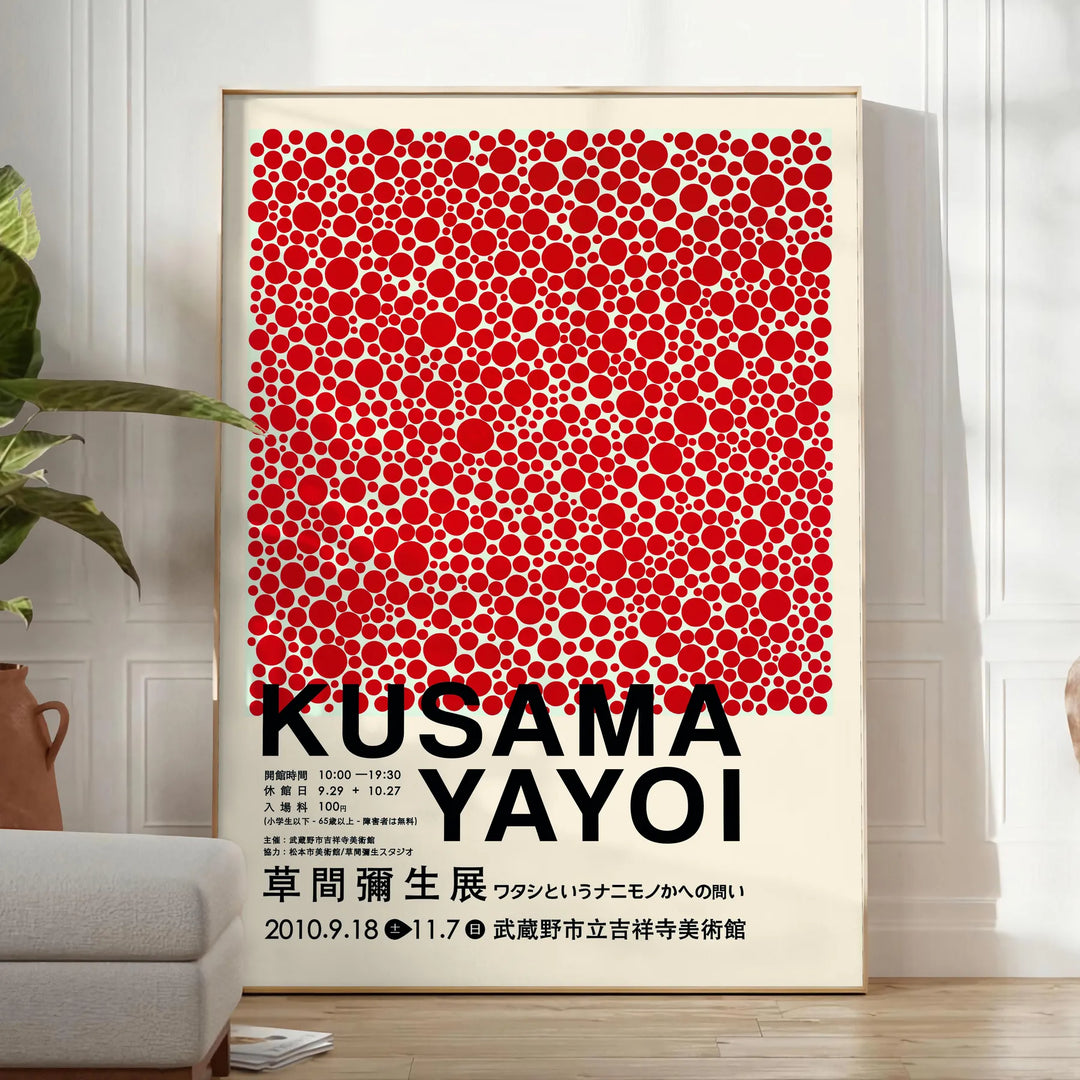 Red dots on a white background with black accents by Yayoi Kusama