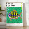 Colorful polka dots on a black background in Yayoi Kusama's signature style - in a bright minimalist room with a plant and an armchair