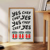 Bold typography featuring 'Yes Chef' in black and red colors - beside a round wooden side table with books