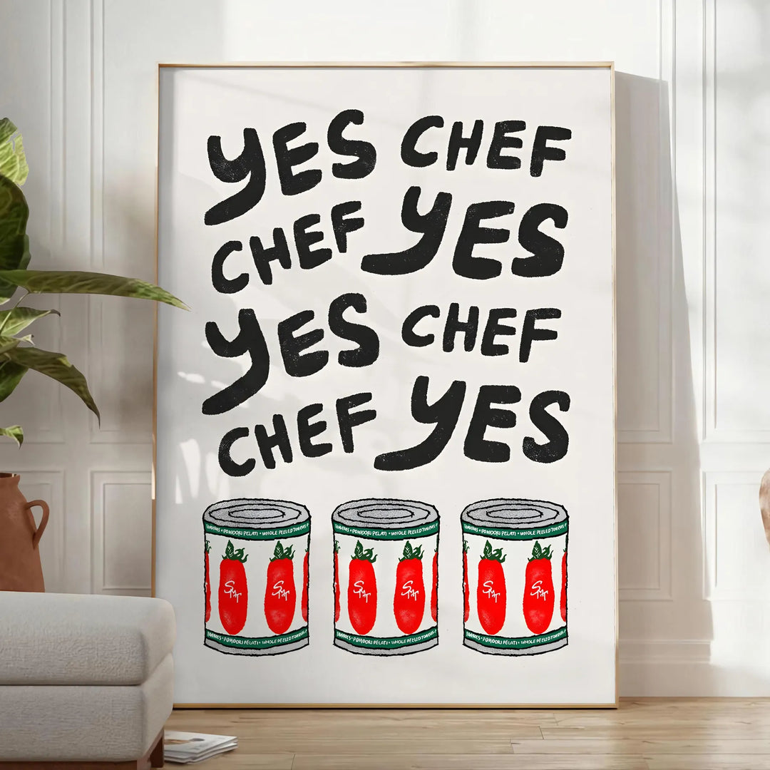 Bold typography featuring 'Yes Chef' in black and red colors - in a bright minimalist room with a plant and an armchair