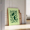 Abstract representation of yoga poses in green and gray hues - leaning on a herringbone floor against a white panelled wall