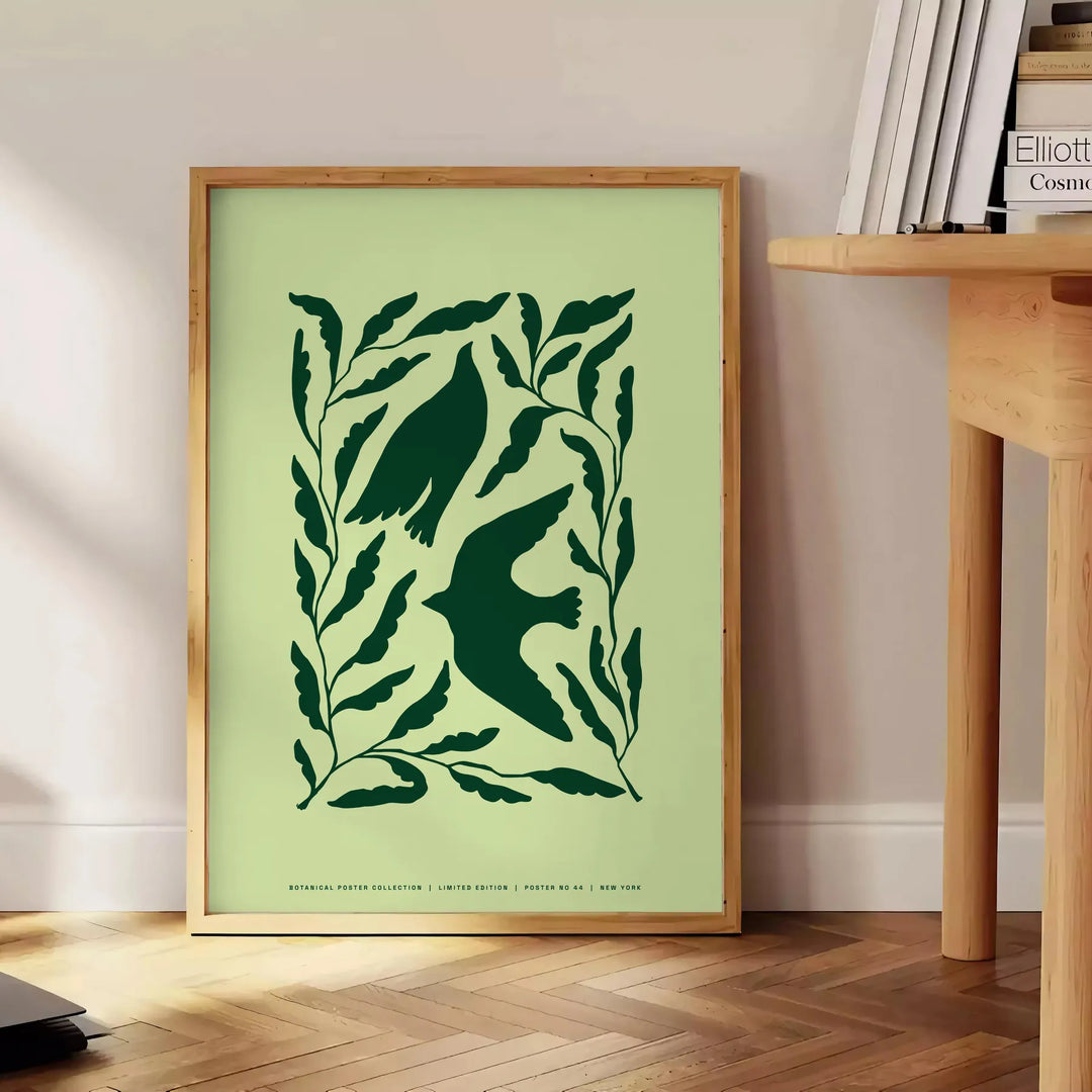 Abstract representation of yoga poses in green and gray hues - beside a round wooden side table with books