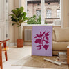 Abstract representation of yoga poses in calming blue and purple tones - in a Parisian living room with a sofa and a fig plant
