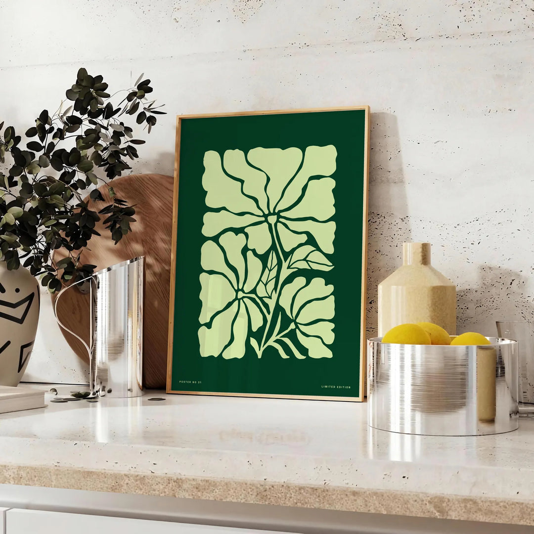 A serene yoga figure in green and gray tones, promoting positivity - styled on a counter with eucalyptus and a bowl of lemons