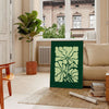 A serene yoga figure in green and gray tones, promoting positivity - in a Parisian living room with a sofa and a fig plant