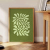Serene yoga scene with green tones and abstract shapes - beside a round wooden side table with books