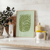A serene yoga scene with calming green and gray tones - styled on a counter with eucalyptus and a bowl of lemons