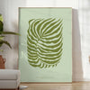A serene yoga scene with calming green and gray tones - in a bright minimalist room with a plant and an armchair
