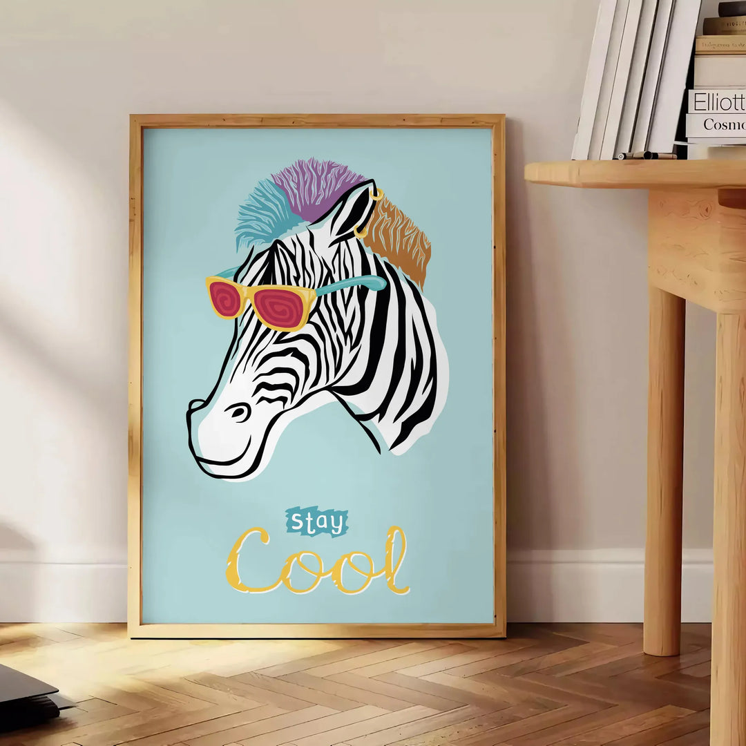 Black and white zebra stripes on a textured background - beside a round wooden side table with books