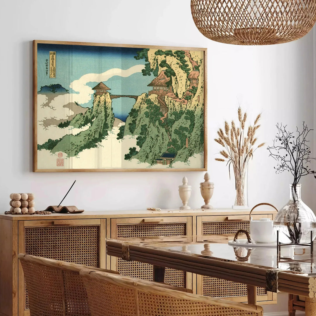 Woodblock-style landscape featuring a bridge shrouded in clouds