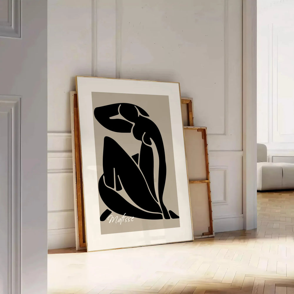 Blue nude figure by Matisse in cut-out style with orange and gray accents