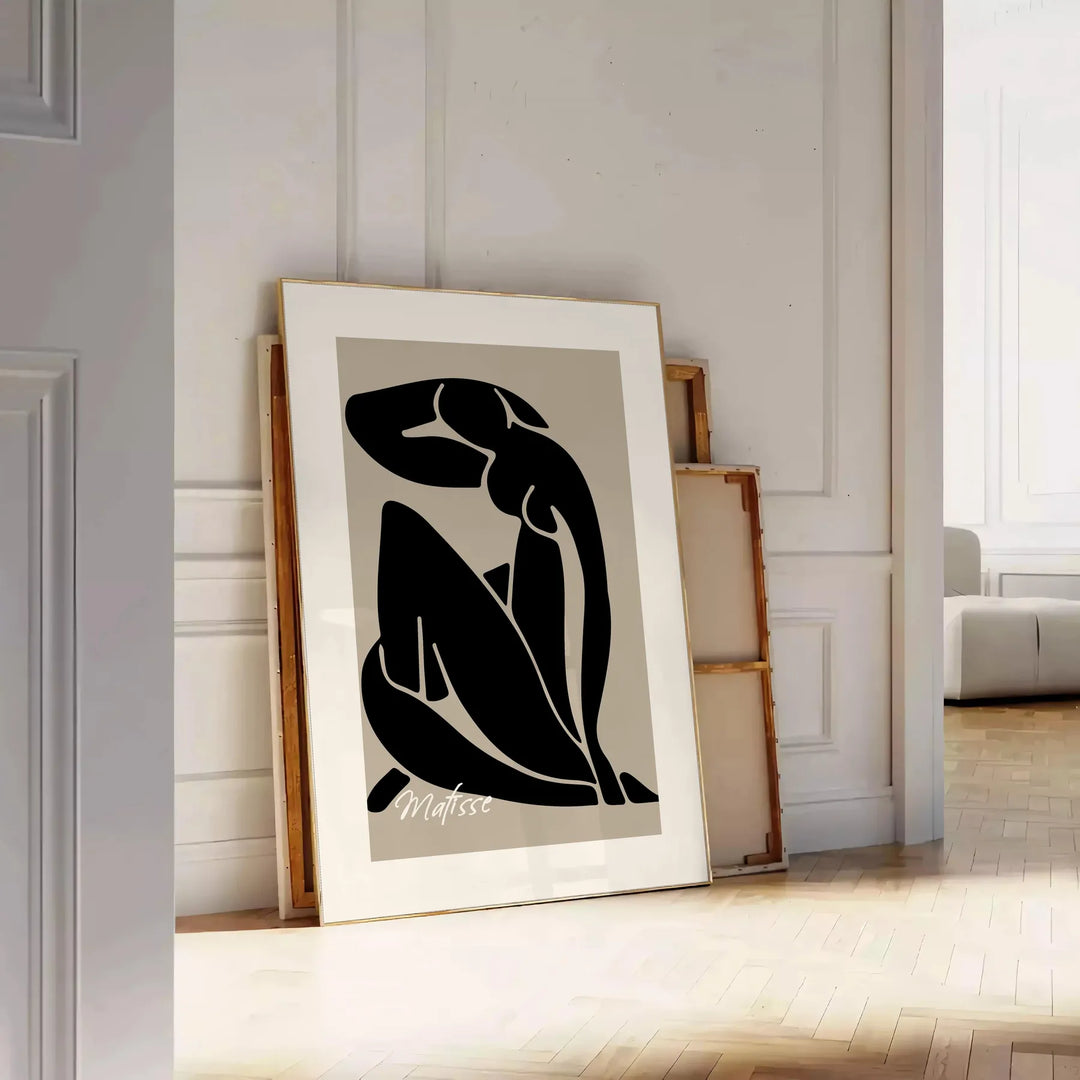 Blue nude figure by Matisse in cut-out style with orange and gray accents