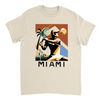 T-shirt featuring a tennis player in action against a Miami skyline