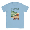 T-shirt featuring a graphic of tennis rackets and balls with Deauville text