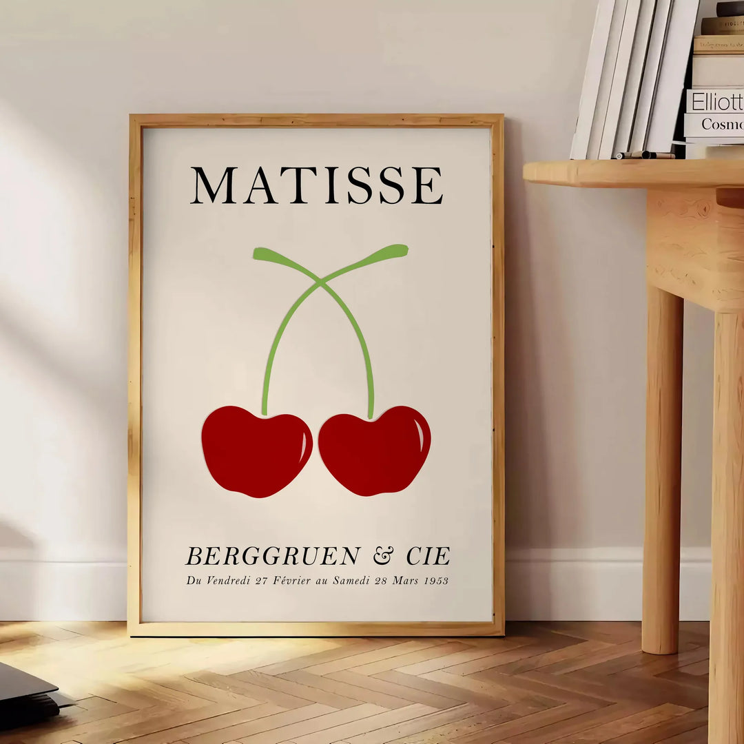 Red and orange paper-cut cherries in a mid-century style