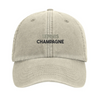 Embroidered cap featuring a vintage tennis champagne design
