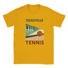 T-shirt featuring a graphic of tennis rackets and balls with Deauville text