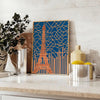 Art Deco Paris poster with stylized cityscape in orange and gray