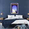 Colorful Moroccan landscape featuring traditional architecture and vibrant blue and orange hues - in a black frame