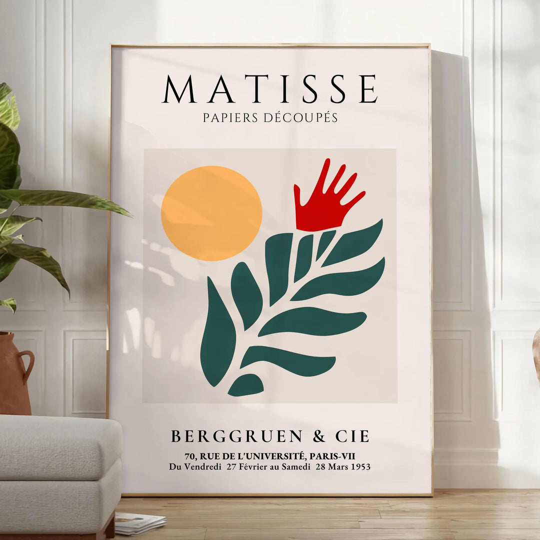 Matisse's paper cut-out artwork featuring abstract shapes in white and green