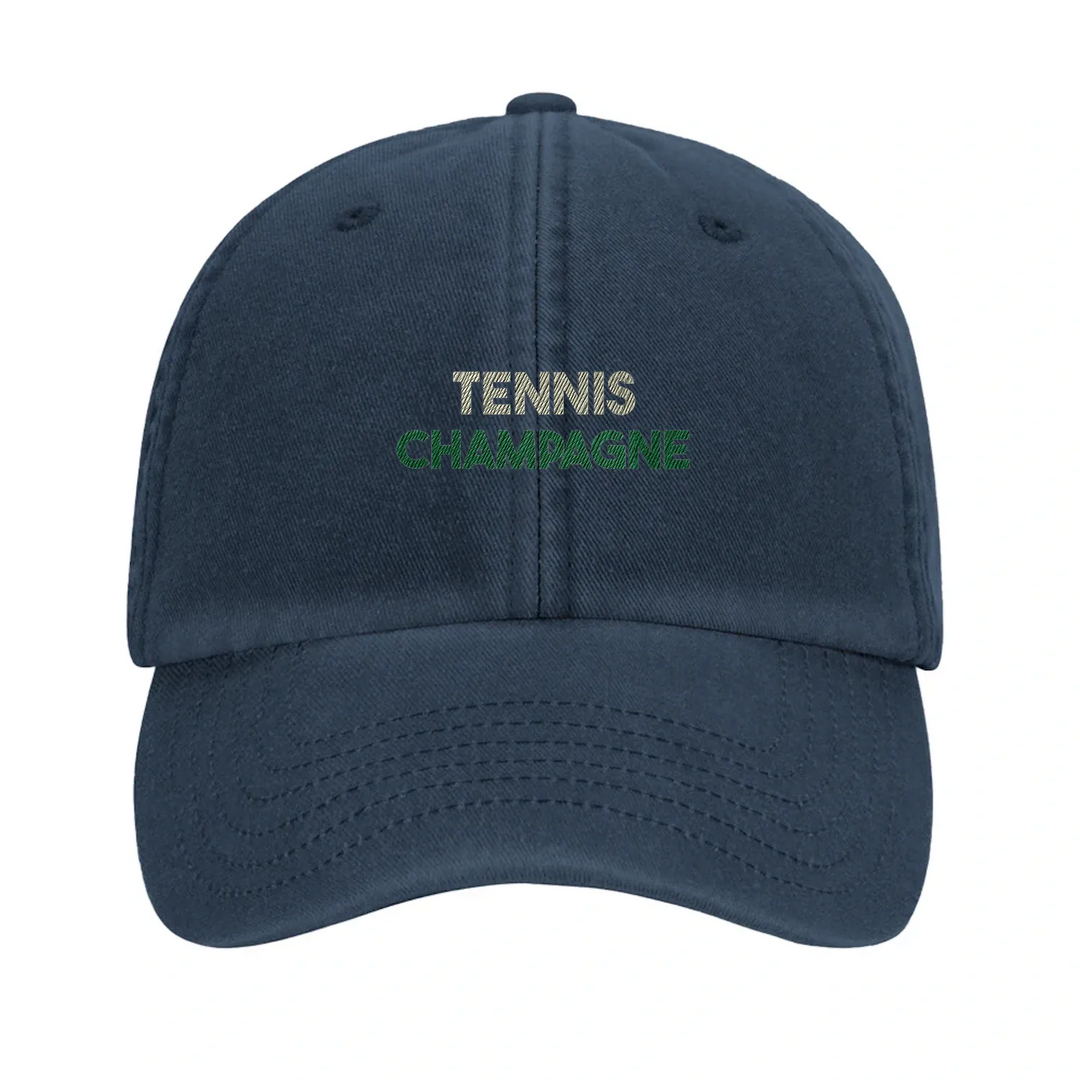 Cap featuring an embroidered vintage tennis design with champagne elements