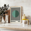 Bauhaus poster with green linear circle, blue and gray geometric minimalism