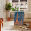 Art Deco Paris poster with stylized cityscape in orange and gray