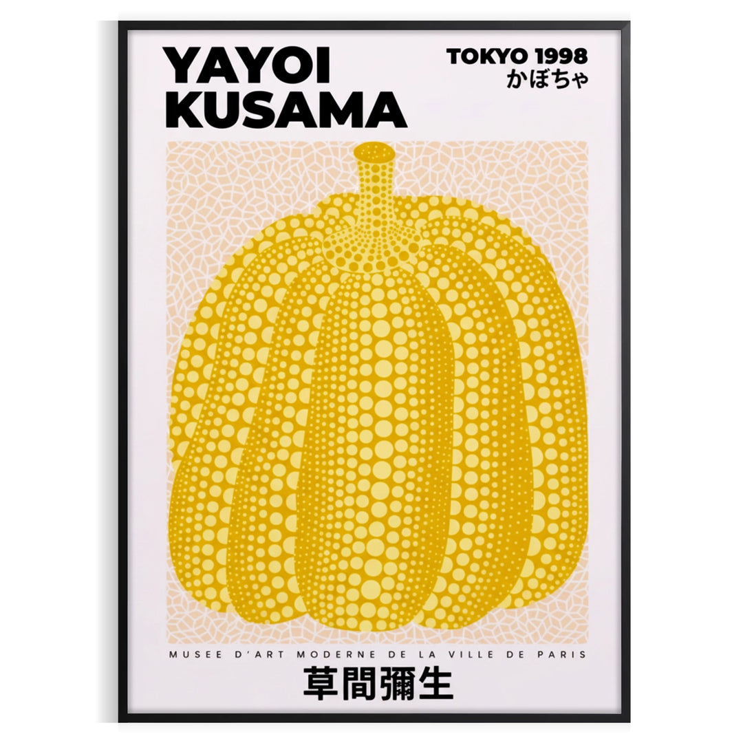 Orange pumpkin with black polka dots on a gray background