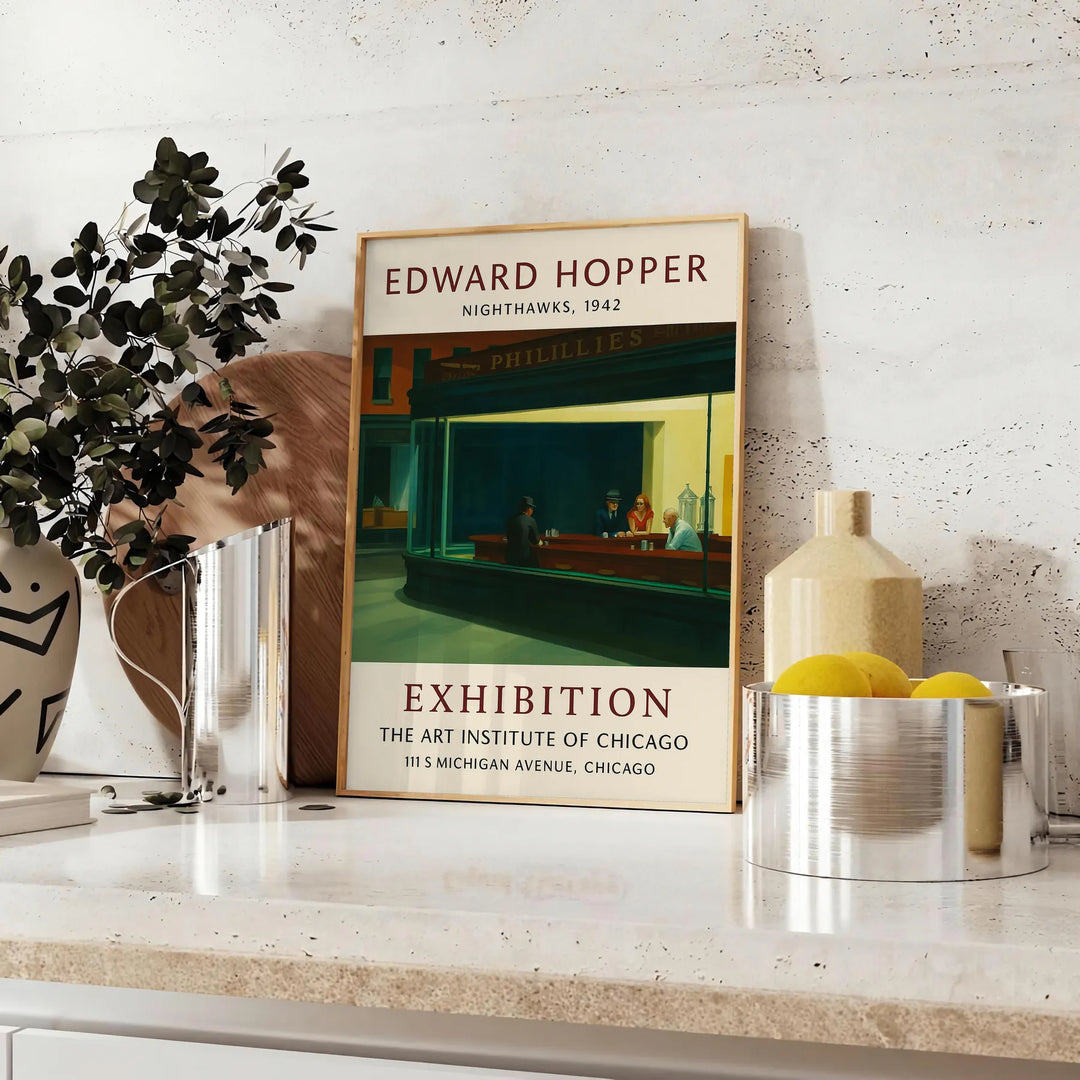 Edward Hopper exhibition poster featuring a realist urban scene with muted gray and orange tones