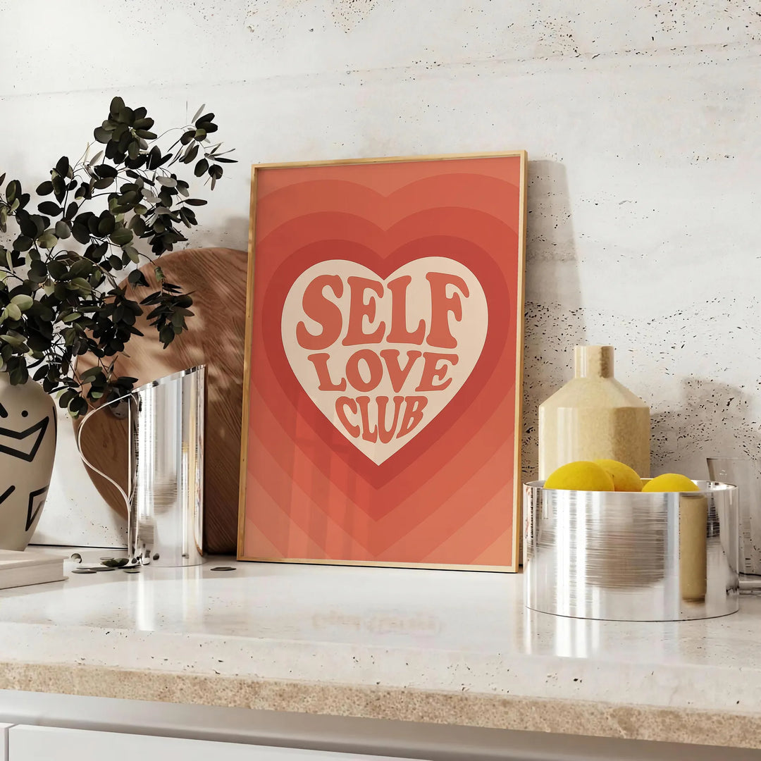 A motivational poster featuring the phrase 'Self Love Club' in bold typography, with energetic orange and red hues.