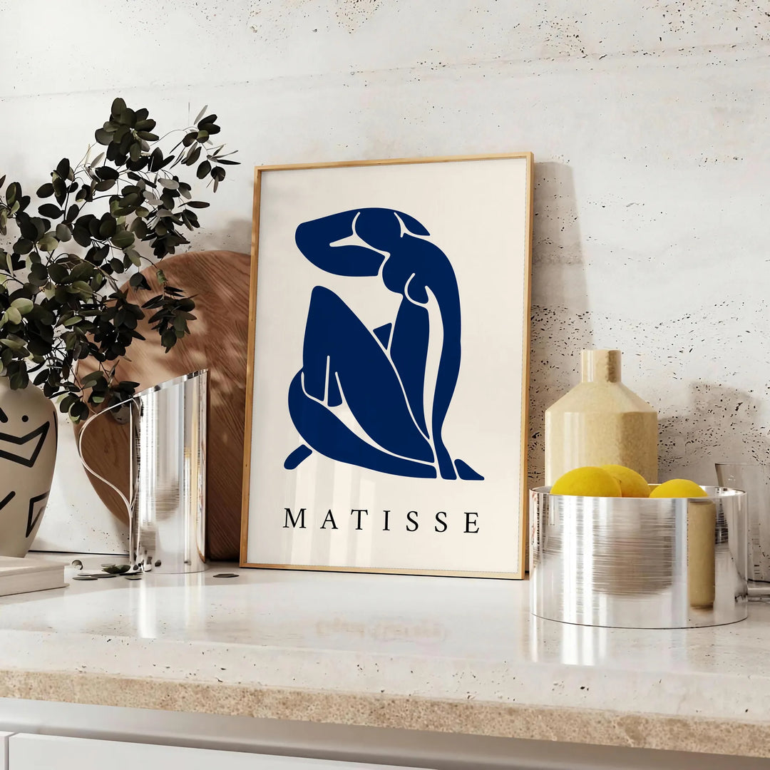 Abstract blue figure on a white and gray background in Matisse's Blue Nude II
