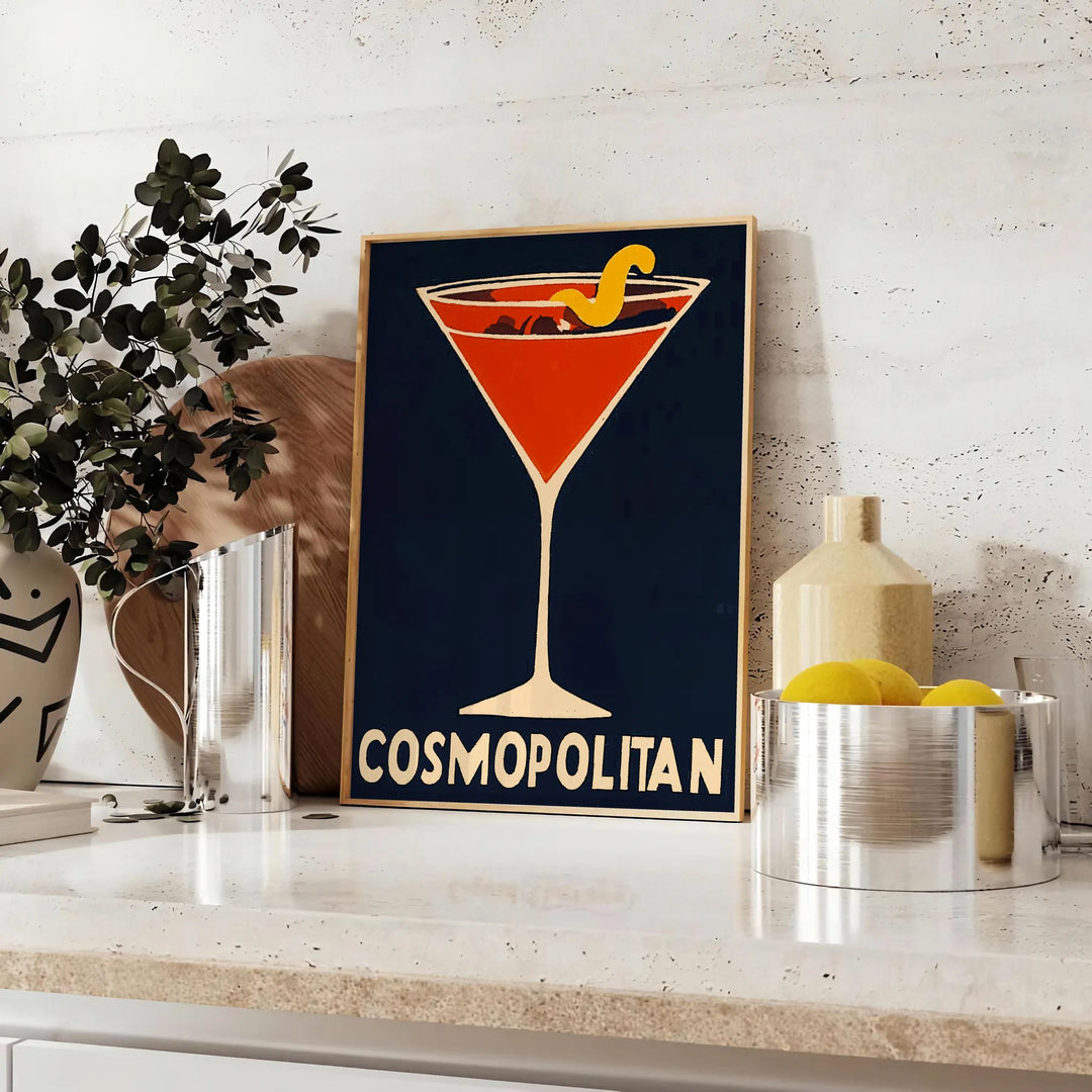 Colorful illustration of a Cosmopolitan cocktail with orange and gray splashes