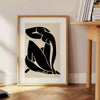 abstract blue nude figure in cut-out style with white and gray accents