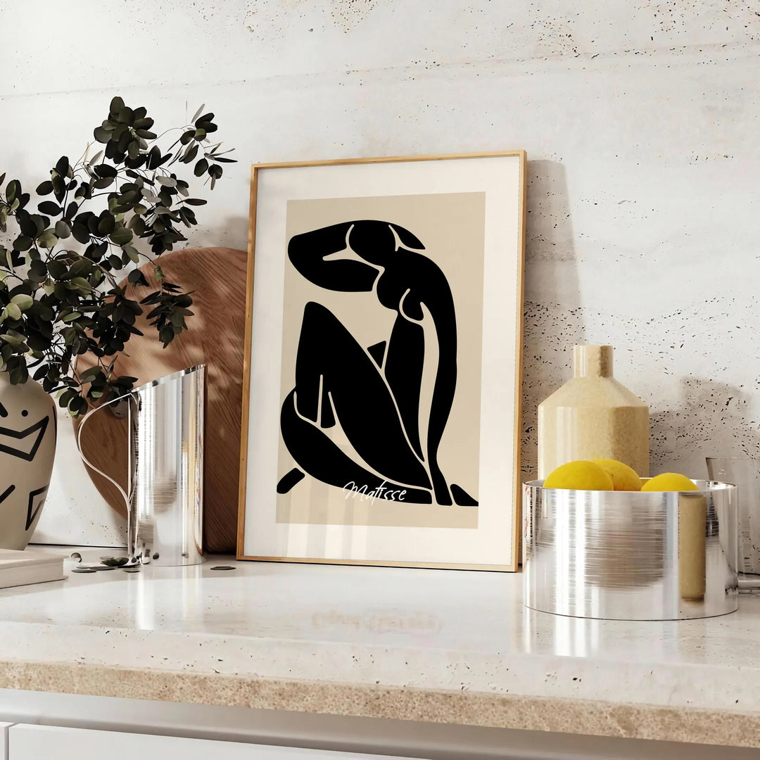 abstract blue nude figure in cut-out style with white and gray accents