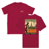 T-shirt featuring a graphic print of tennis elements and the Eiffel Tower