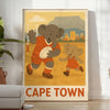 T-shirt featuring a playful elephant playing rugby in Cape Town