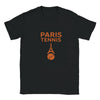 T-shirt featuring a graphic of tennis rackets and a ball with Paris landmarks