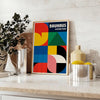 Bauhaus poster featuring blue and red geometric shapes in minimalist style