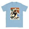 T-shirt featuring a graphic of tennis rackets and a Miami skyline