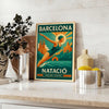 Swimmer diving in front of the Barcelona skyline, featuring yellow and green tones