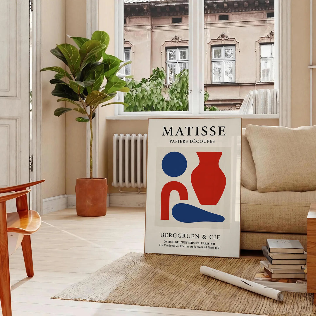 Poster showing Matisse cut-paper composition in white and gray tones