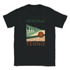 T-shirt featuring a graphic of tennis rackets and balls with Deauville text