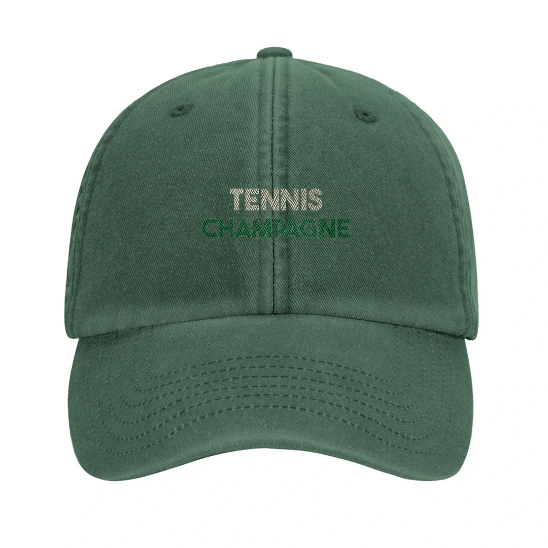 Cap featuring an embroidered vintage tennis design with champagne elements