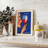 Vintage cocktail poster showing wine glass illustration in orange and red